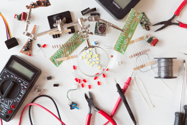 istock Electrician and plumber tools, electrical parts and components with accessories, isolated white background. DIY, do it yourself concept 1084526422