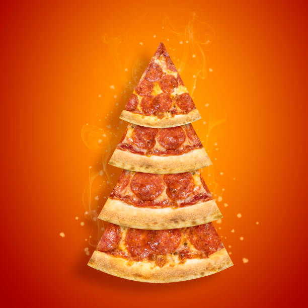 Christmas promotion flyer with pepperoni pizza slice in shape of Christmas tree on orange background. Creative concept new year poster pizza Christmas promotion flyer with pepperoni pizza slice in shape of Christmas tree on orange background. Creative concept new year poster pizza. snag tree stock pictures, royalty-free photos & images