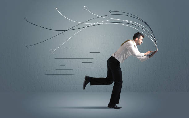 istock Running businessman with device and hand drawn lines 1084529280