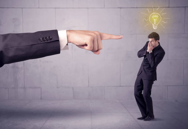 istock Boss blaming sales person with an idea 1084530168