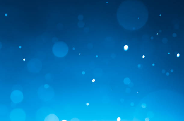 Dark blue abstract backgrounds with bokeh.