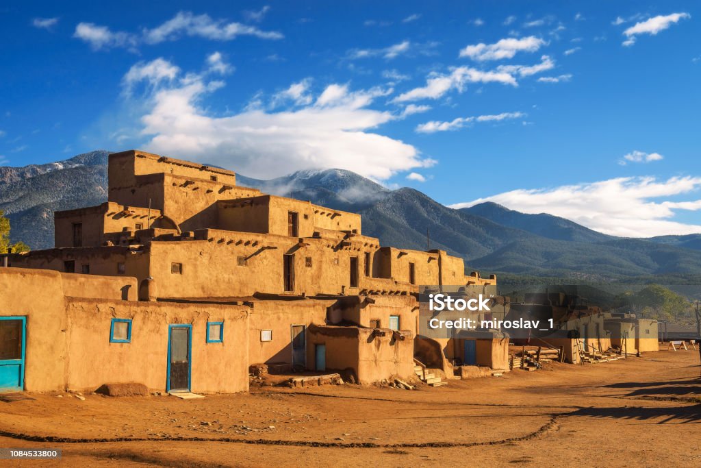 Ancient dwellings of Taos Pueblo, New Mexico Ancient dwellings of UNESCO World Heritage Site named Taos Pueblo in New Mexico. Taos Pueblo is believed to be one of the oldest continuously inhabited settlements in USA. New Mexico Stock Photo