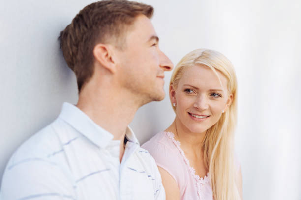 istock Attractive young blond woman watching her husband 1084540926