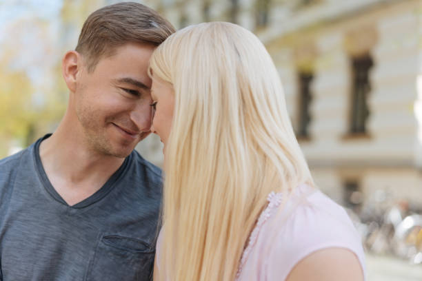 istock Loving couple touching foreheads in tenderness 1084543108