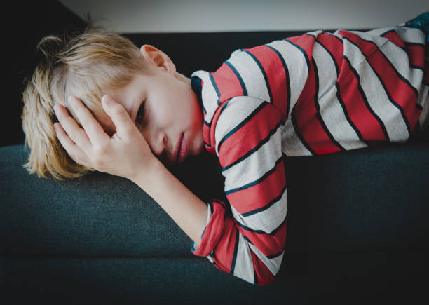 istock sad stressed tired exhausted child at home 1084543112