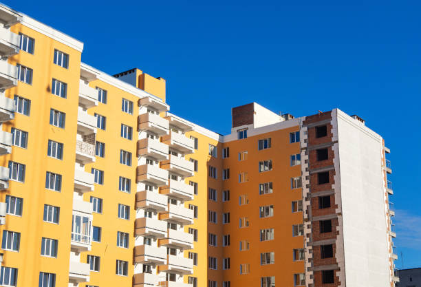 istock Thermal exterior insulation of new multi-storey building 1084552716