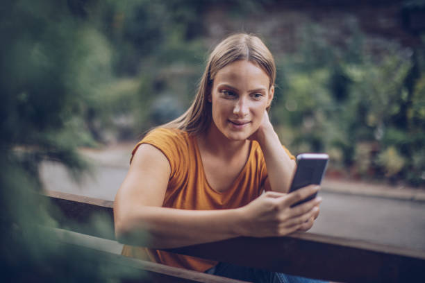 istock She got some good news on the phone 1084563204