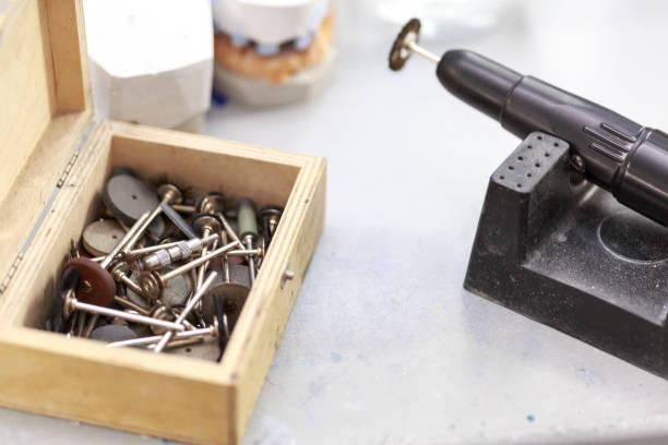 istock Box with dental cutters and milling on dentistry lab. 1084566382