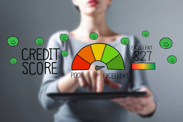 istock Excellent credit score with woman using a tablet 1084584530
