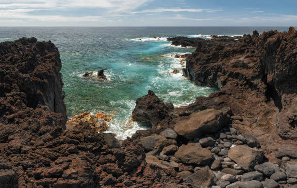 istock Volcanic coastline in Ferraria, Sao Miguel 1084587718