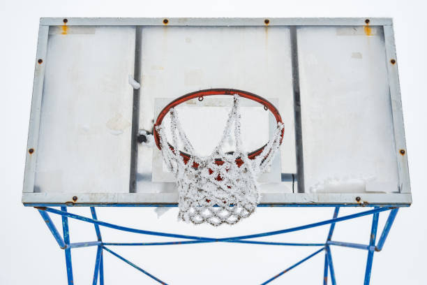 istock Basketball court covered with snow 1084593576