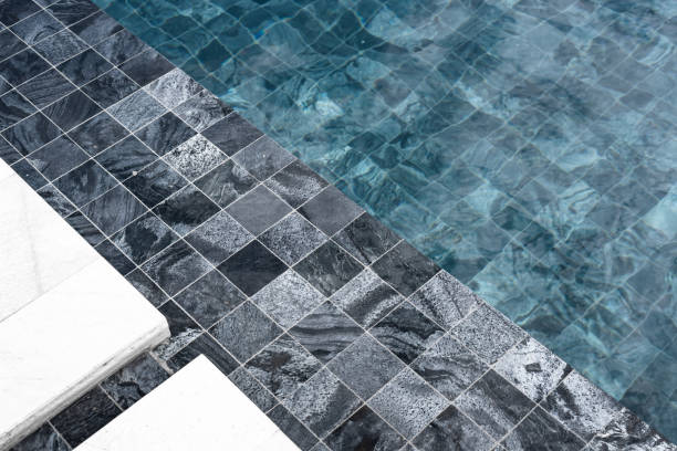 istock part of swimming pool with blue water 1084593860