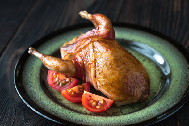 istock Baked quail wrapped in bacon 1084595620