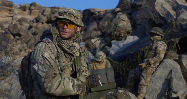 istock Soldiers taking a break from patrol 1084600986
