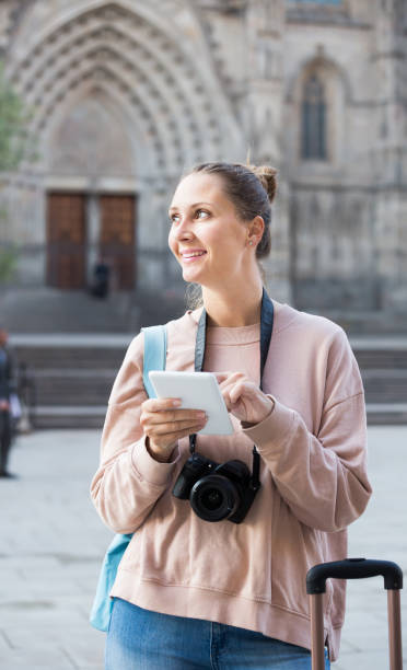 istock traveling  woman  searching for the direction 1084609782