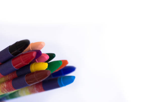 istock Colored wax pencils on a white background close-up 1084609854