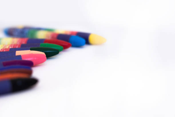 istock Colored wax pencils on a white background close-up 1084609856