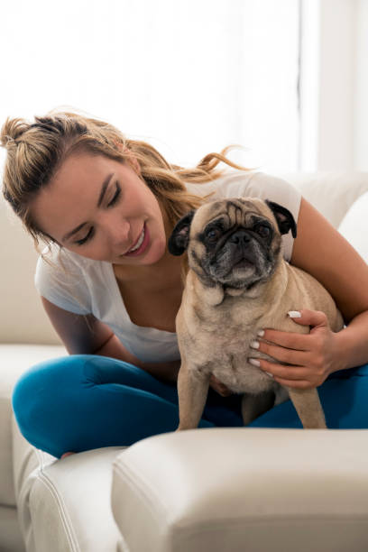 istock Woman with her pet dog 1084611294