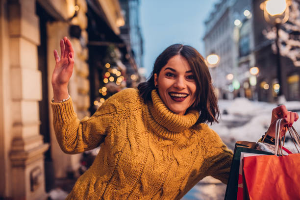 istock Girl with shopping bags 1084618568