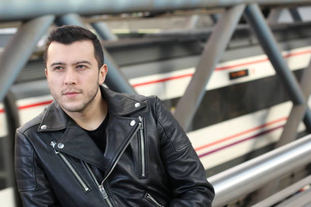 Ethnic young man waiting in underground station.