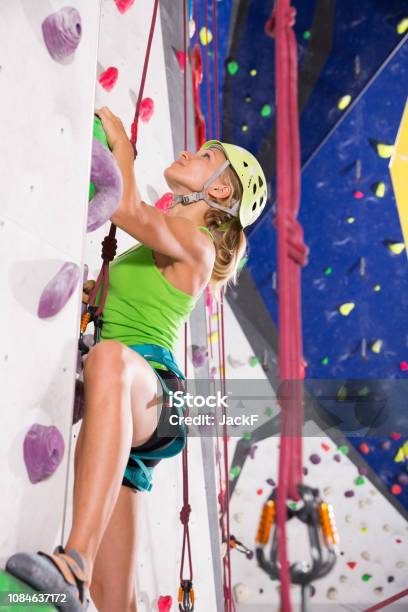 Woman In Climbing Outfit Training At Bouldering Gym Stock Photo - Download  Image Now - iStock