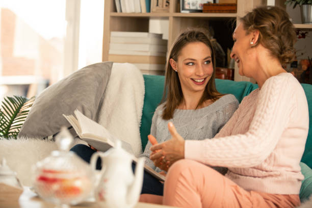 istock Mother sharing memories with daughter 1084645866