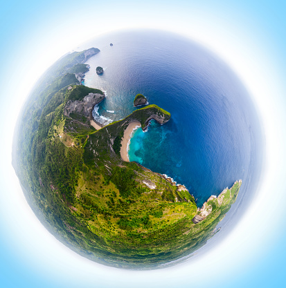 Aerial panorama of the Kelingking beach located on the island of Nusa Penida in a form of a little planet. Indonesia
