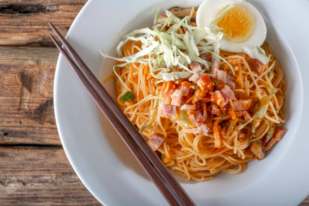 istock Asian Noodle with Chopped Bacon and Egg 1084654790