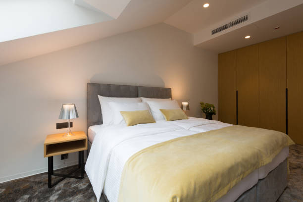 istock Interior of a hotel apartment loft bedroom 1084656144