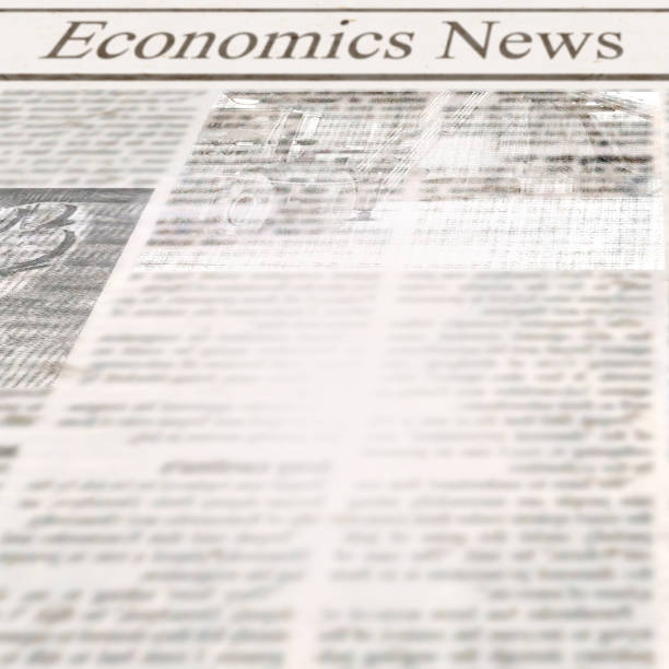 istock Newspaper with headline Economics News and old unreadable text 1084659342