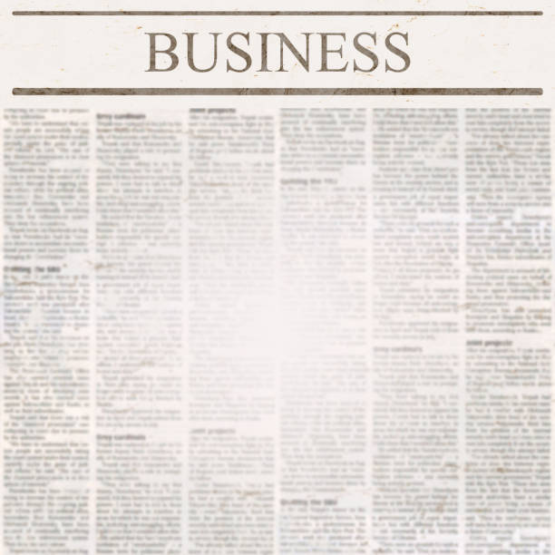 istock News newspaper with headline Business and old unreadable text 1084659346