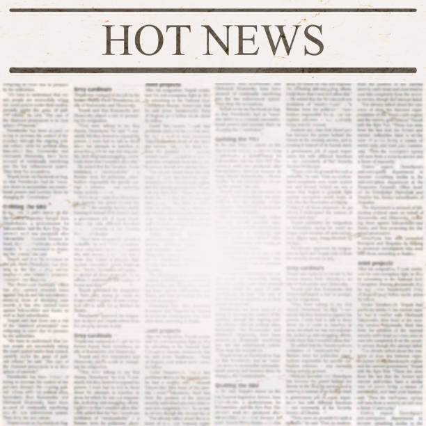 istock Newspaper with headline Hot News and old unreadable text 1084659492