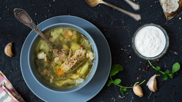 istock First course. Chicken soup and sour cream 1084660956