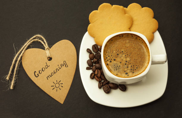 istock Black coffee and cookie on wooden background breakfast, close-up 1084665158