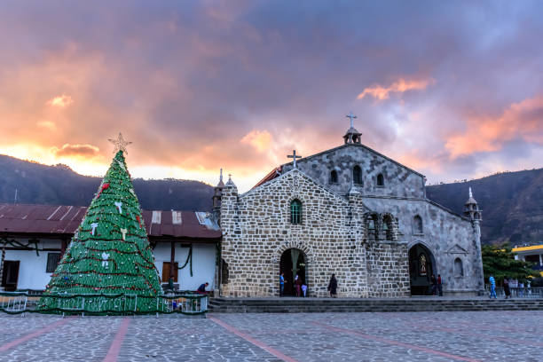 Christmas tree & Catholic church at sunset, Lake Atitlan, Guatemala stock photo