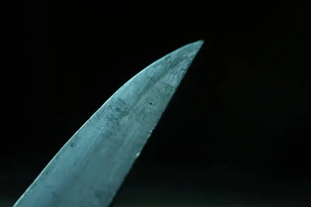 Photo of black background knife