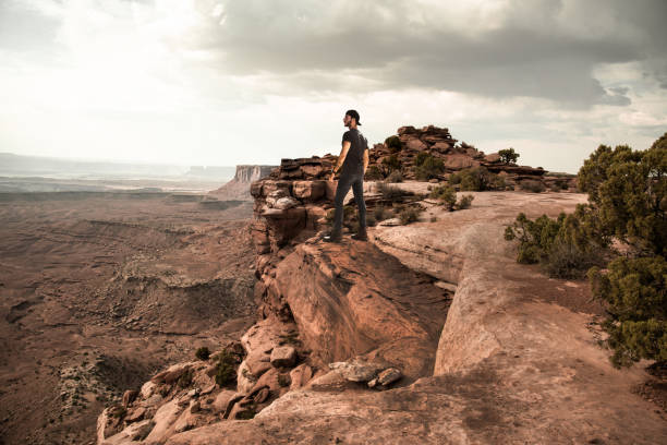 istock man on top of canyonlands 1084687428