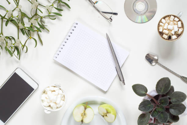 istock Coffee break in the workplace on a white background 1084690874