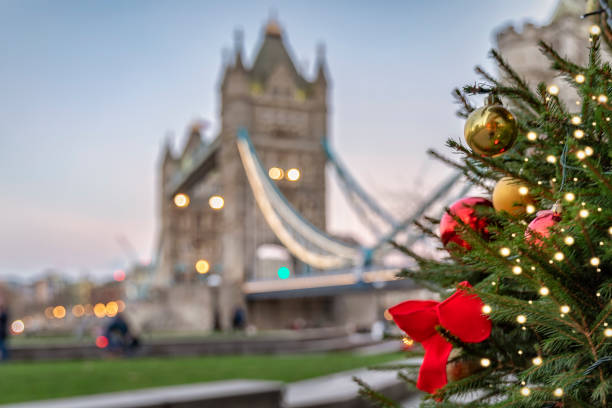 istock Christmas Tree in front of the Tower Bridge in London 1084697584