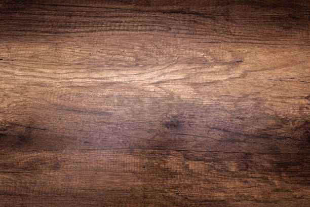 istock Brown scratched wooden cutting board. Wood texture 1084699202