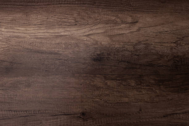 istock Brown scratched wooden cutting board. Wood texture 1084699240