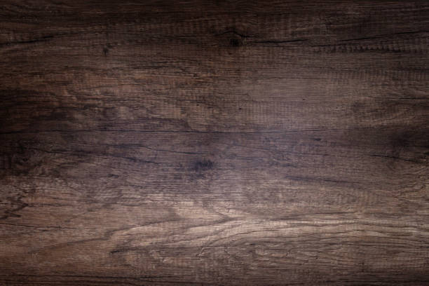 istock Brown scratched wooden cutting board. Wood texture 1084699264