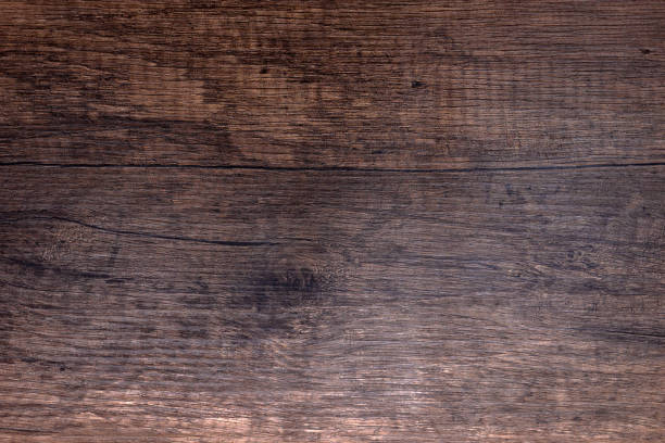 istock Brown scratched wooden cutting board. Wood texture 1084699322