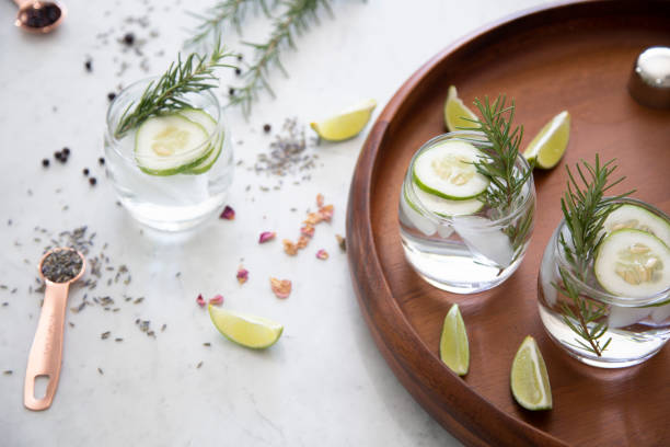 Gin Cocktail with garnish Cocktails on marble table top with spices vodka soda top view stock pictures, royalty-free photos & images