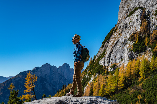 Young Adult Man Hiking, Enjoy the amazing landscape ,Julian Alps,Gorenjska,Slovenia,Europe