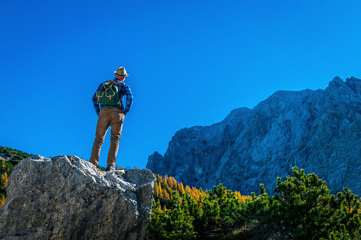 Young Adult Man Hiking, Enjoy the amazing landscape ,Julian Alps,Gorenjska,Slovenia,Europe