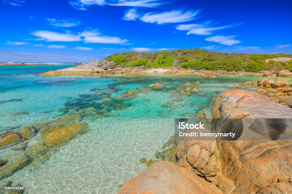 William Bay National Park William Bay National Park, Denmark region, Western Australia. Tropical turquoise waters of Madfish Beach surrounded by rock formations. Sunny blue sky. Popular summer destination in Australia. Adulation Stock Photo