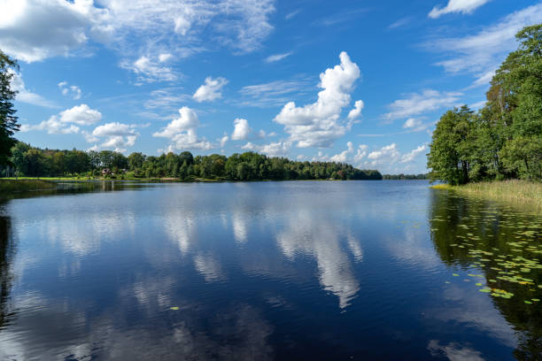 istock high contrast clouds on blue sky over natural landscape 1084704180
