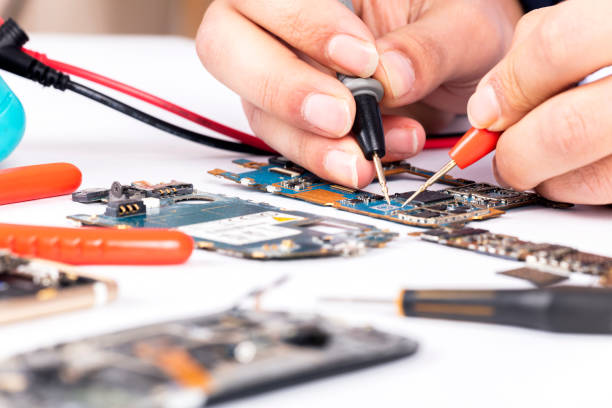 istock Repairing phone 1084707456