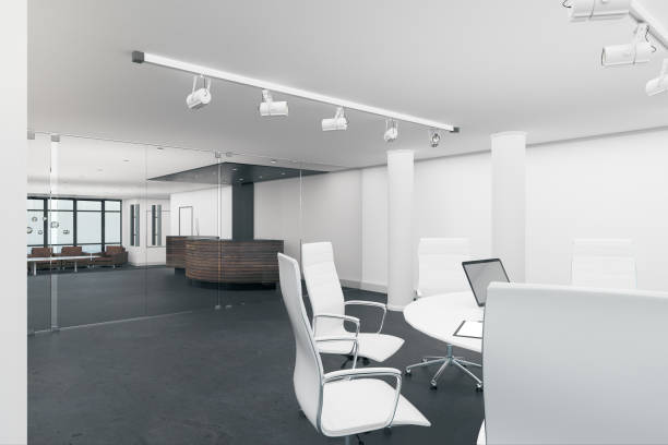 istock Bright meeting room with laptop 1084709020